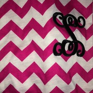 scarf with the letter “S”